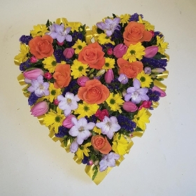 Colourful heart funeral tribute